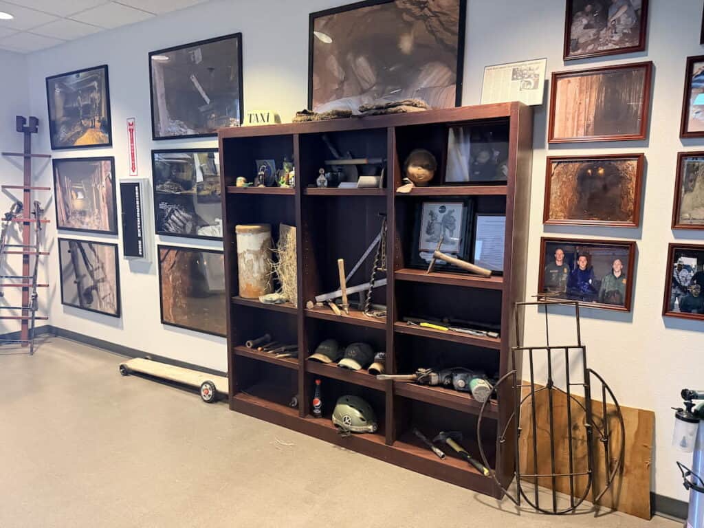 Wall filled with personal belongings collected during raids