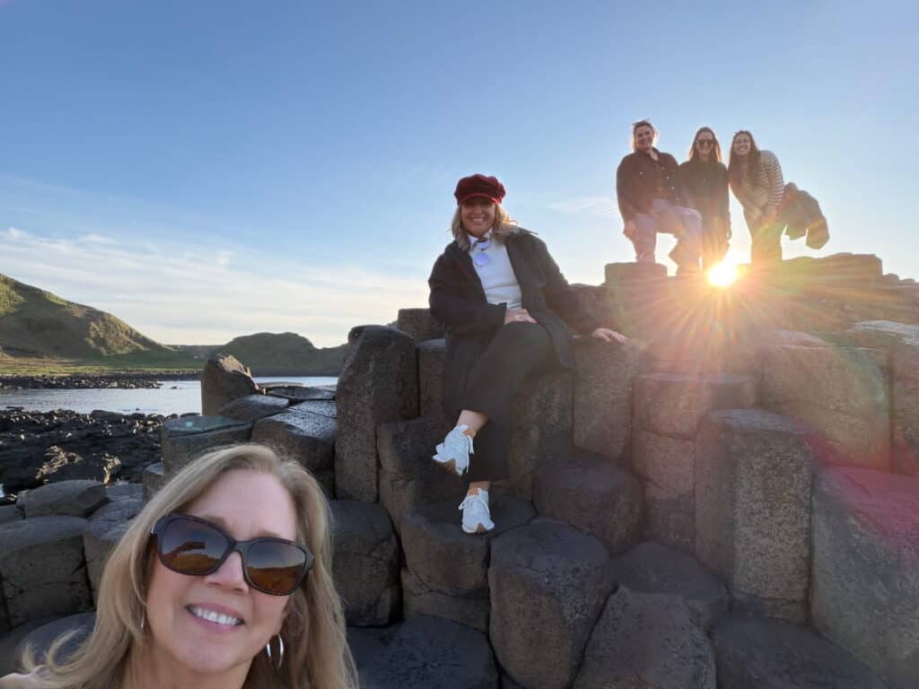 Amplify Peace group at Giant’s Causeway in Northern Ireland at sunset